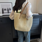 Straw shoulder tote bag interior and strap