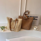 Straw tote bag styled for the beach