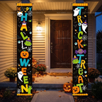 Happy Halloween banner hanging on a decorated front porch