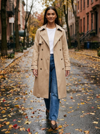 Beige double breasted trench coat for women on an autumn city street