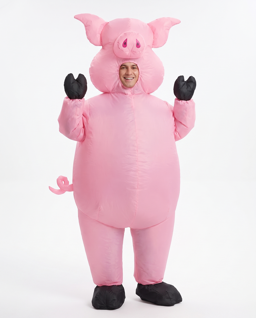 Adult wearing an inflatable pink pig costume, front view