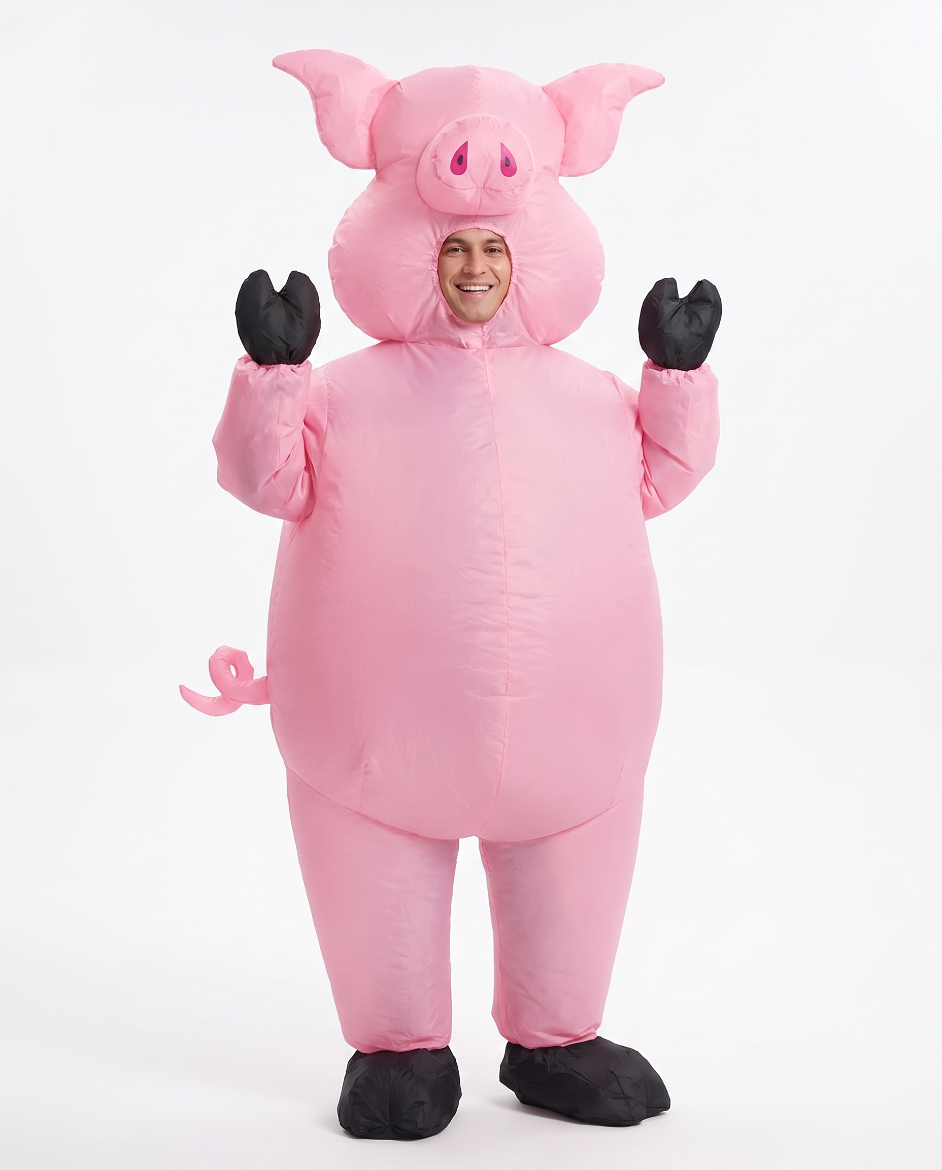 Adult wearing an inflatable pink pig costume, front view