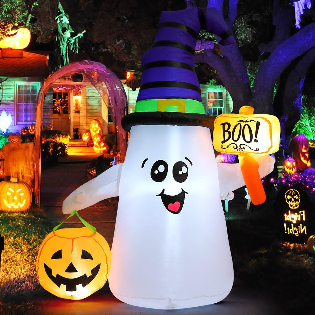 Inflatable wizard ghost holding a glowing jack-o-lantern