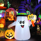 Inflatable wizard ghost holding a glowing jack-o-lantern