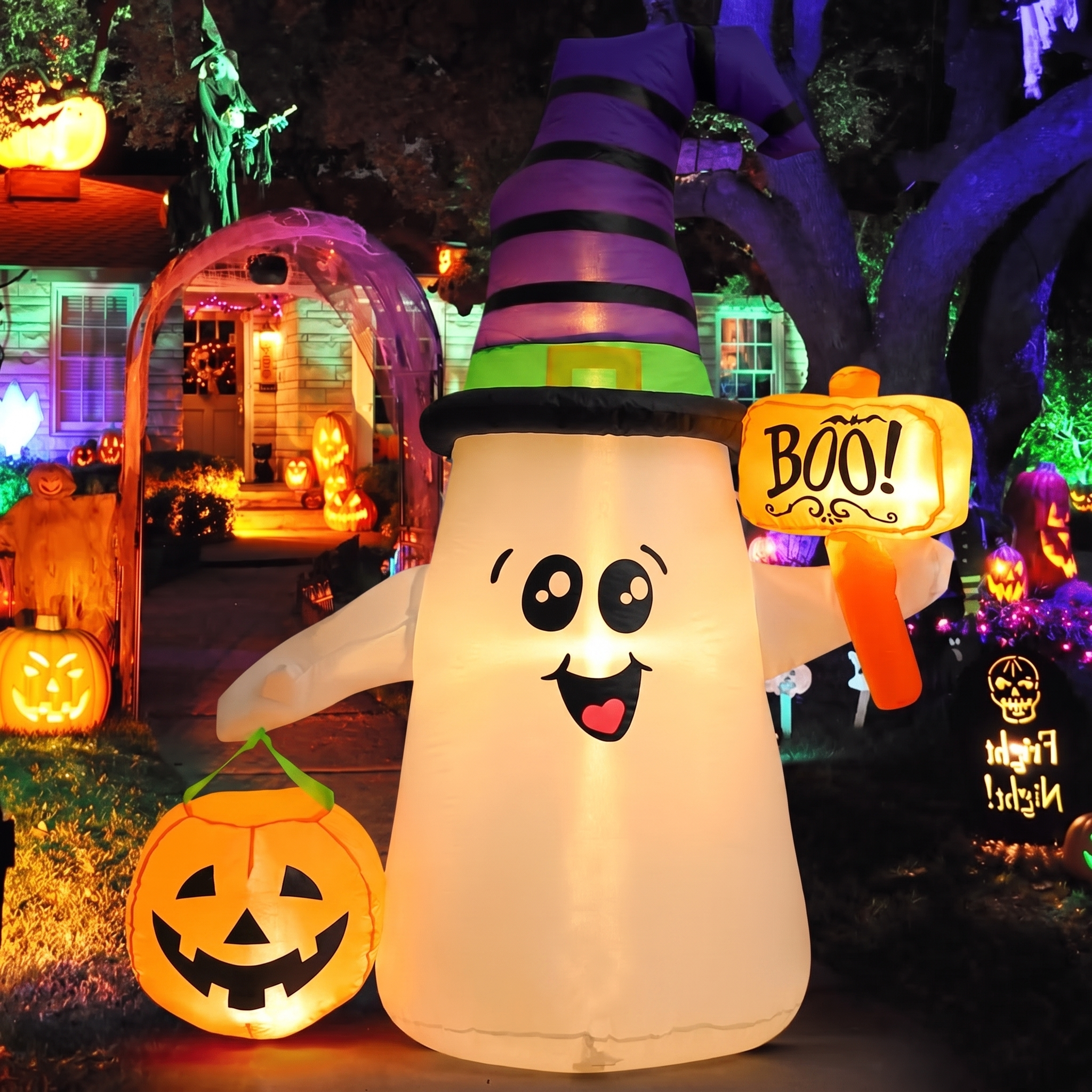 Wizard ghost inflatable beside a decorated front porch