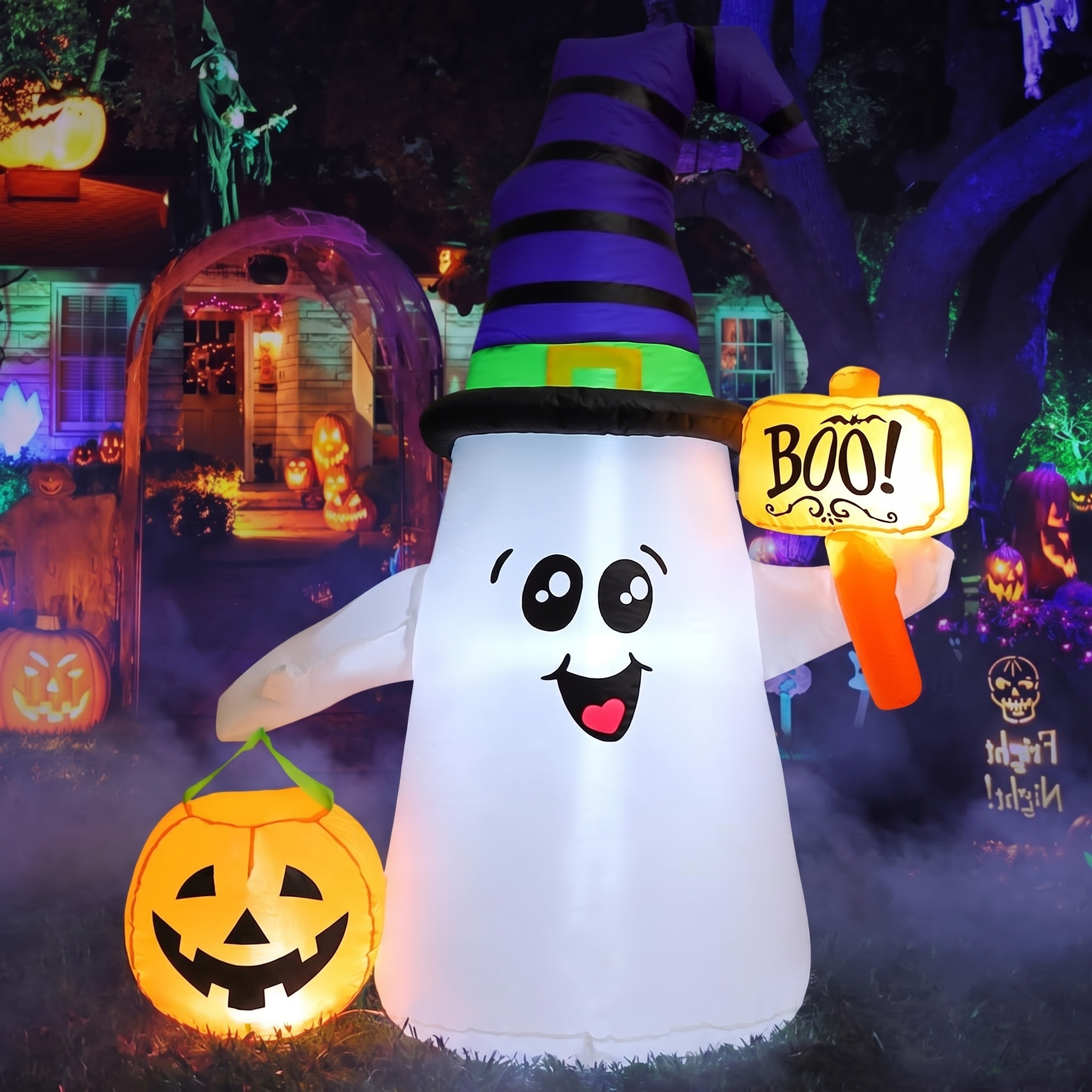 Close-up of the glowing pumpkin held by the wizard ghost inflatable