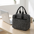 Thickened nylon insulated lunch bag on a wooden office desk beside a laptop