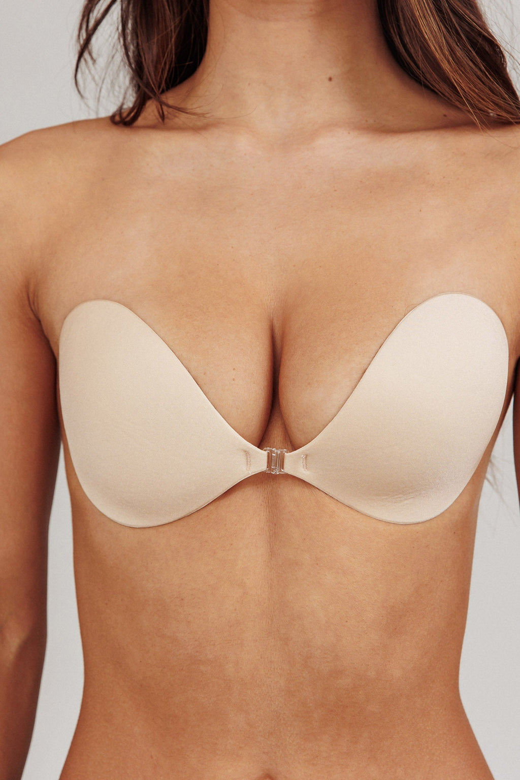 Invisible adhesive bra with padded cups, front view