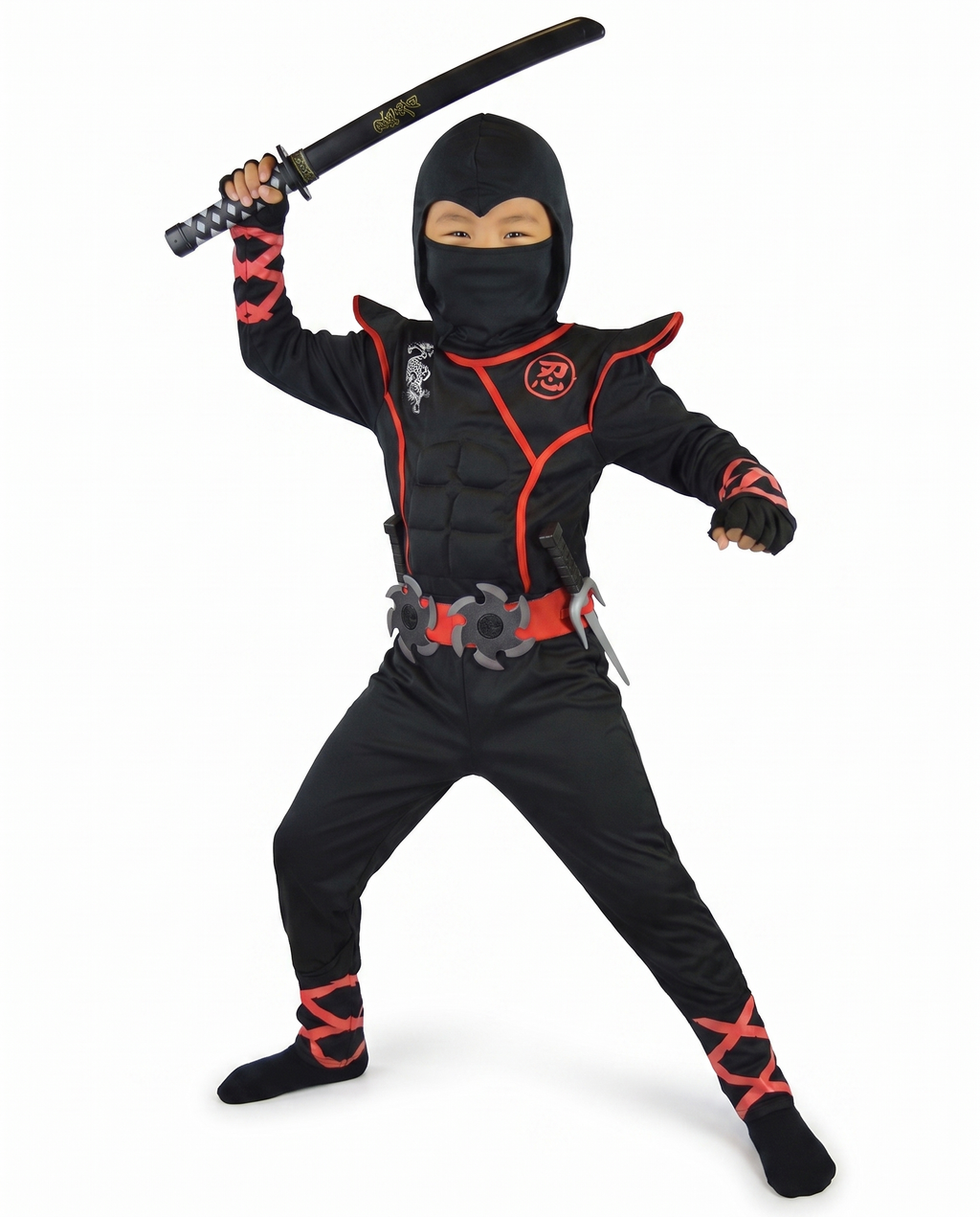 Child wearing a black and red ninja costume holding a toy sword