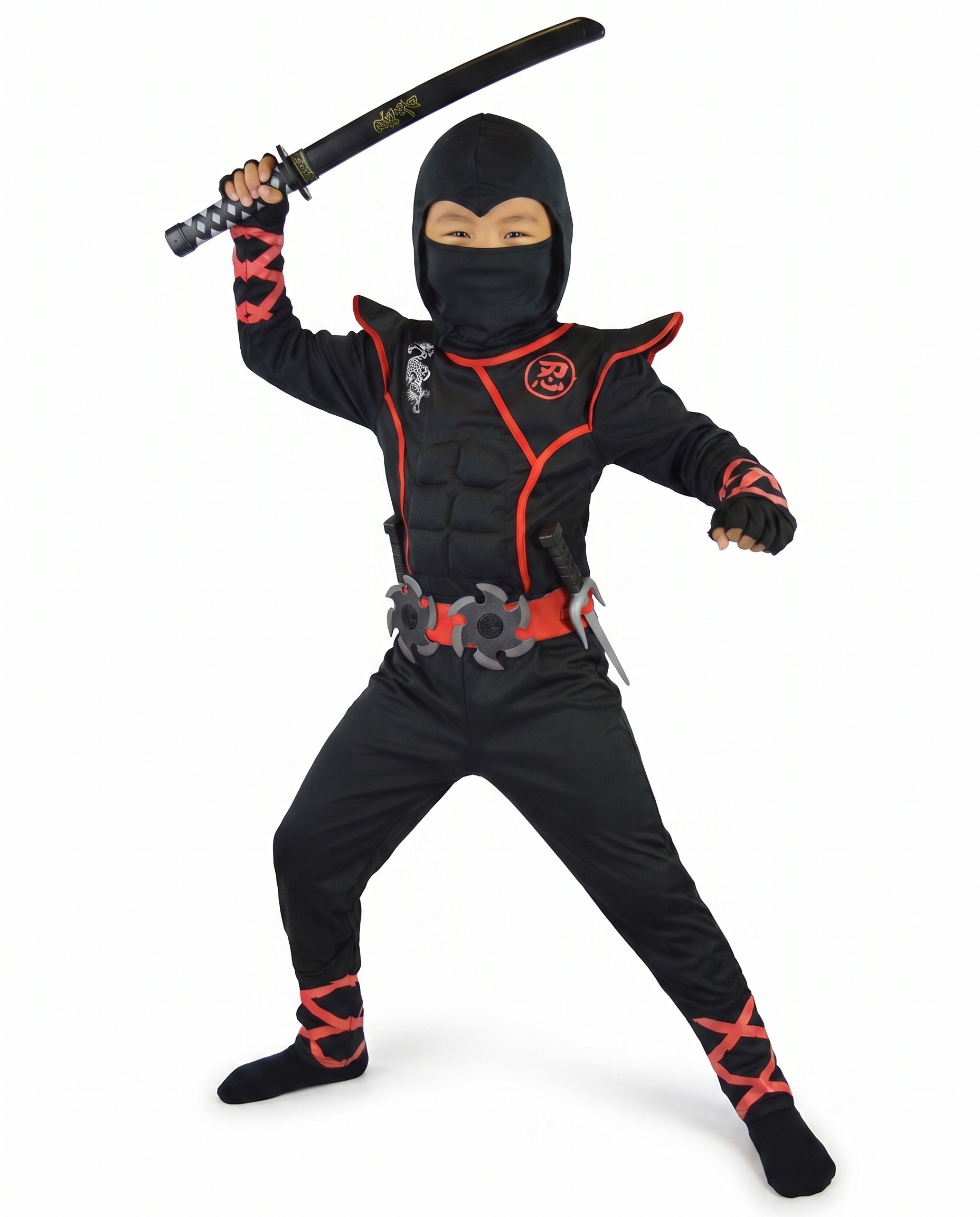 Child wearing a black and red ninja costume holding a toy sword