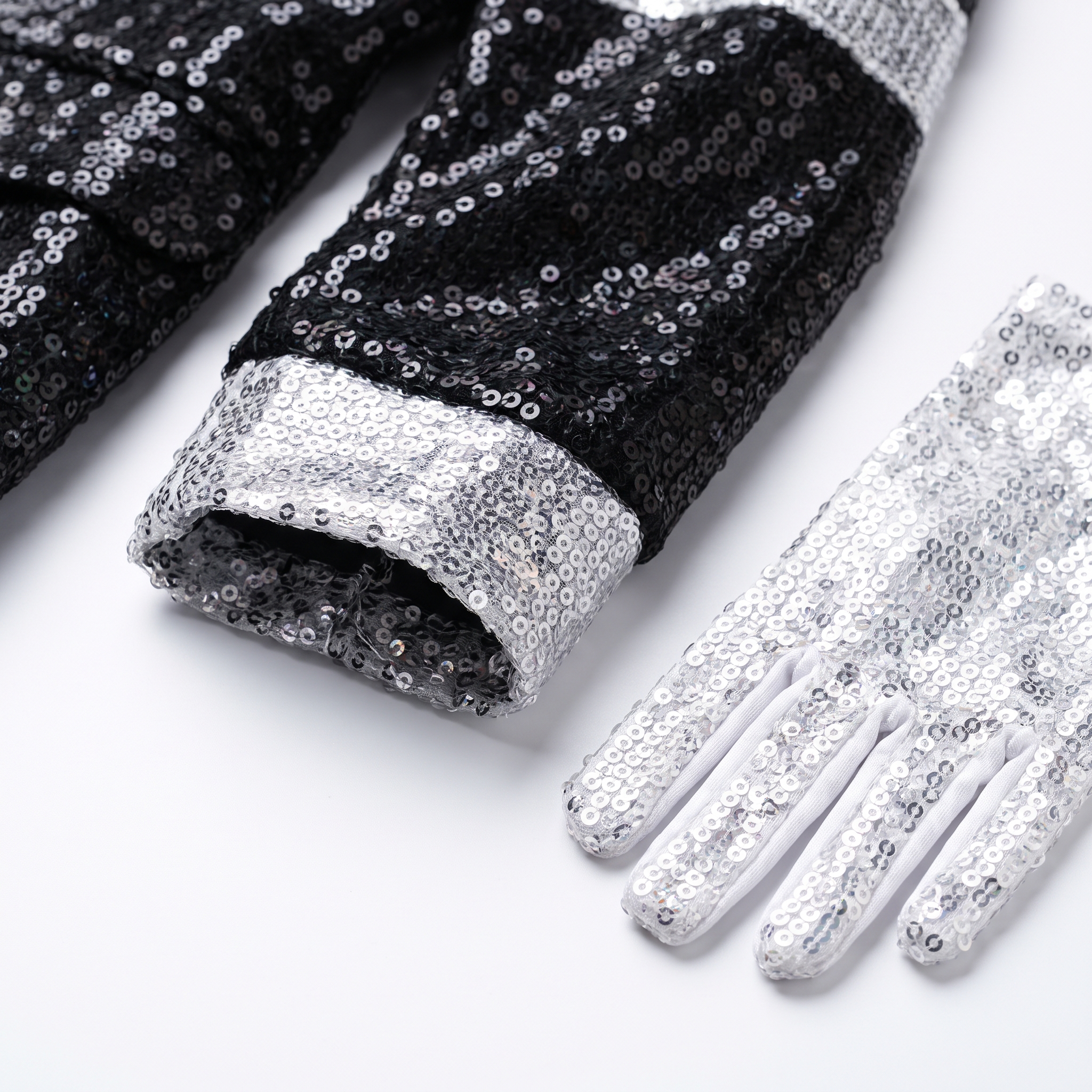 Sequin jacket and white glitter glove detail