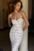 White lace maxi dress with intricate all-over detailing