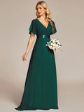 Long chiffon bridesmaid dress with empire waist and flutter sleeves in dark green