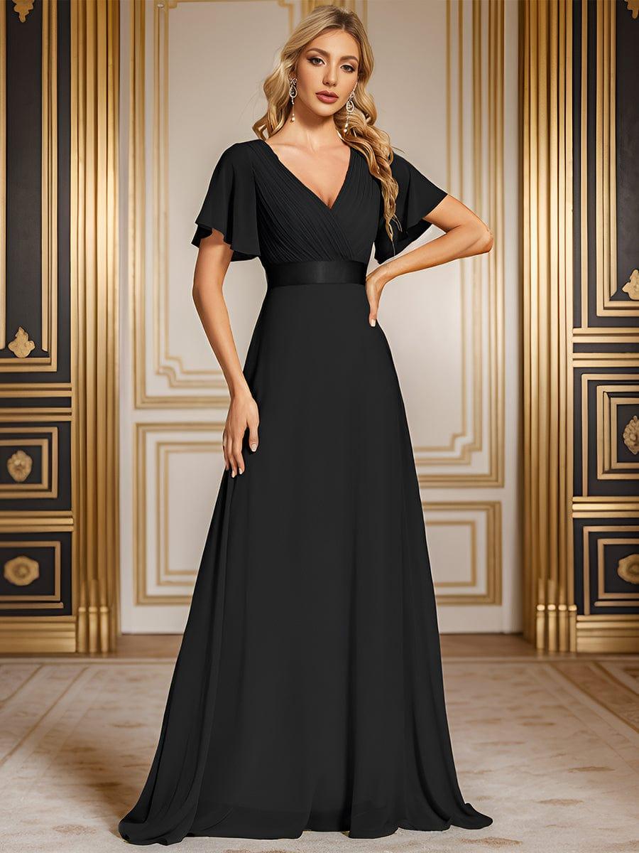 Long chiffon bridesmaid dress with empire waist and flutter sleeves in black