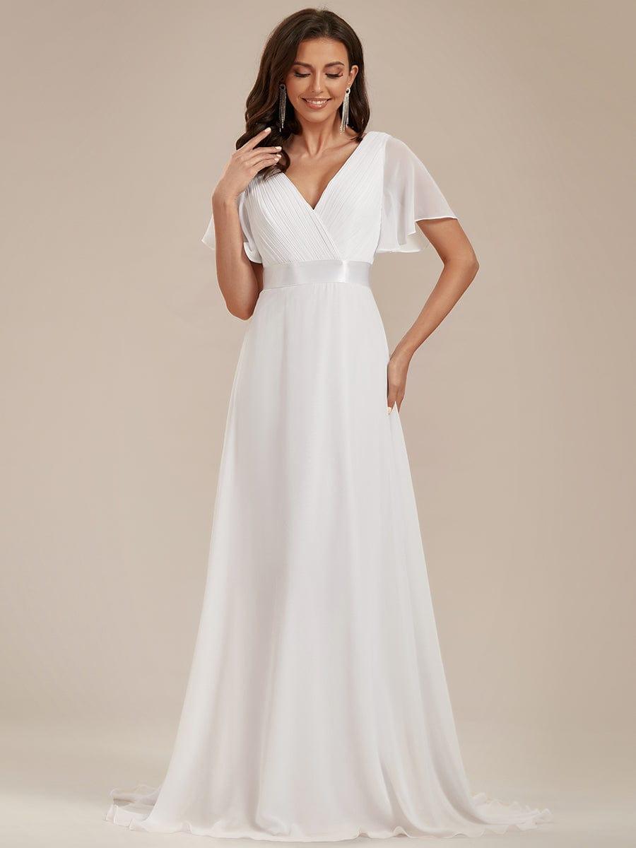 Long chiffon bridesmaid dress with empire waist and flutter sleeves in white