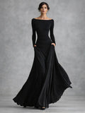 Long sleeve draped maxi dress in black, front view