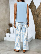 Flowy top and wide-leg pants detail