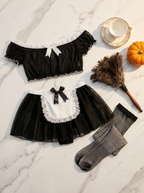 Maid costume set flat lay with feather duster