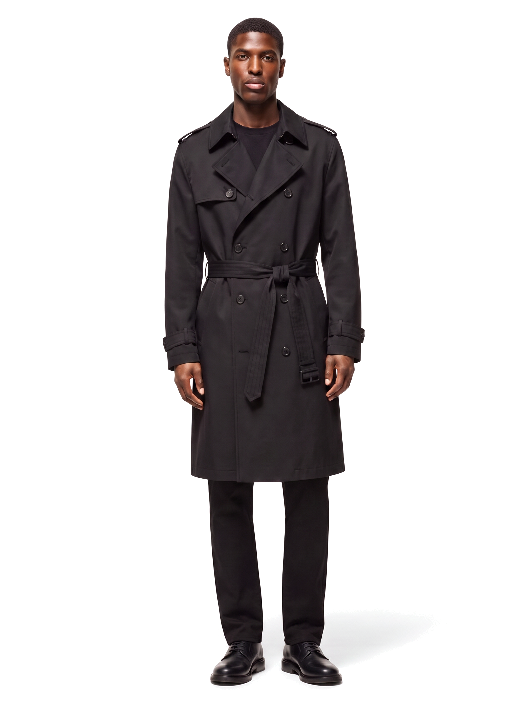 Black double breasted belted trench coat, front view on model