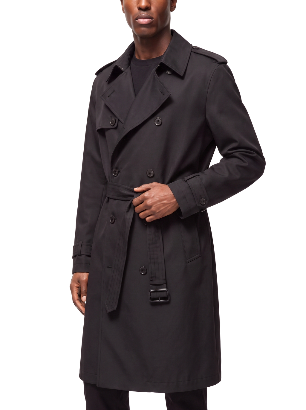 Black trench coat three quarter view showing tailored fit