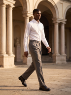 Grey pleated trousers worn outdoors, lifestyle view