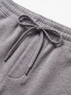 Drawstring waistband and fleece texture close up detail