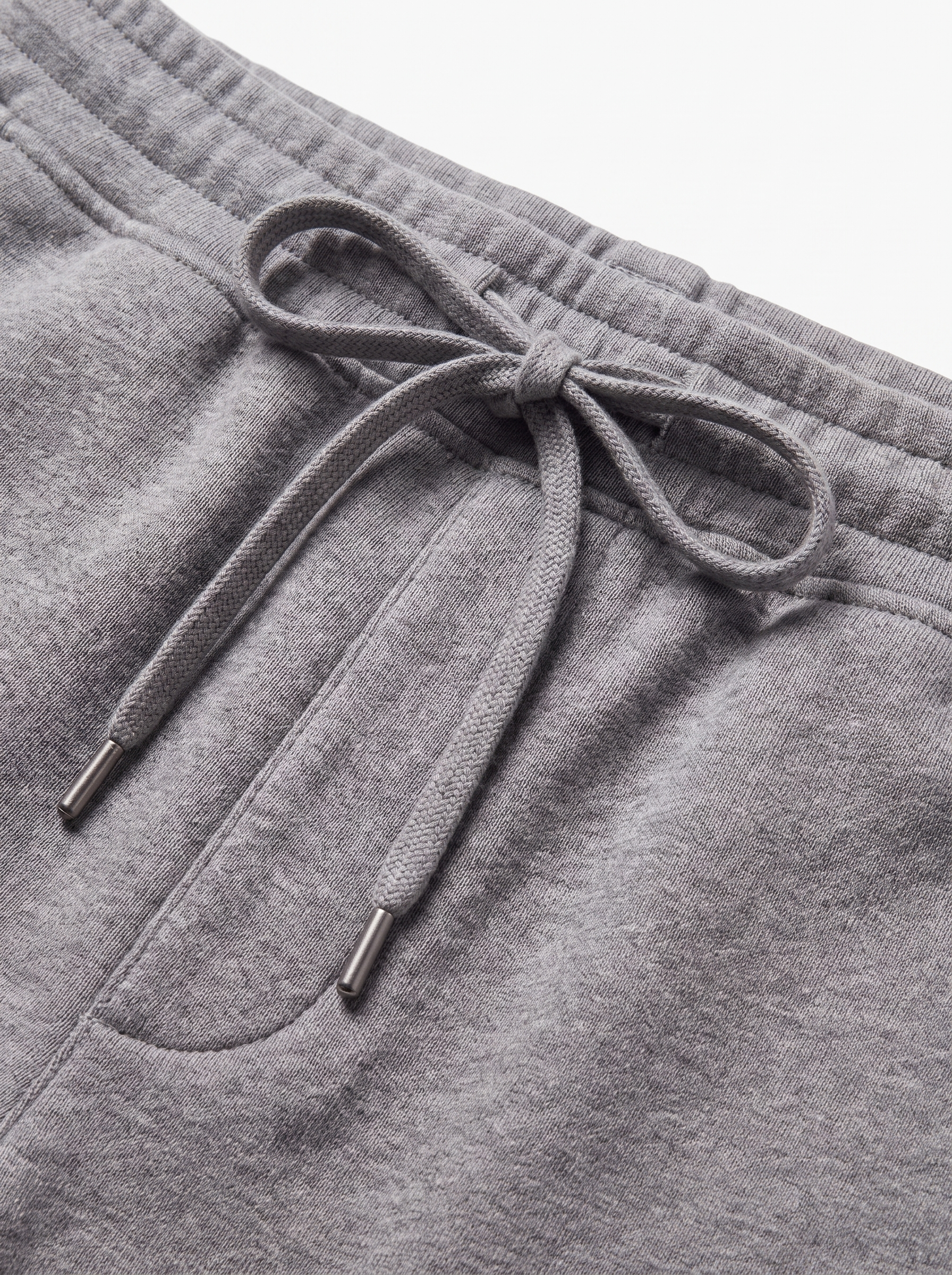 Drawstring waistband and fleece texture close up detail