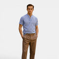 Men's linen polo shirt in light blue, front view