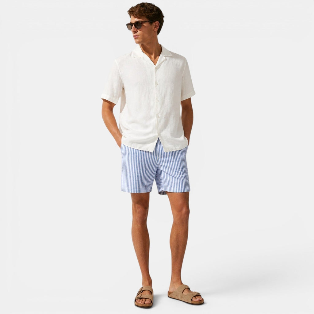 Men's light blue linen shorts fabric detail