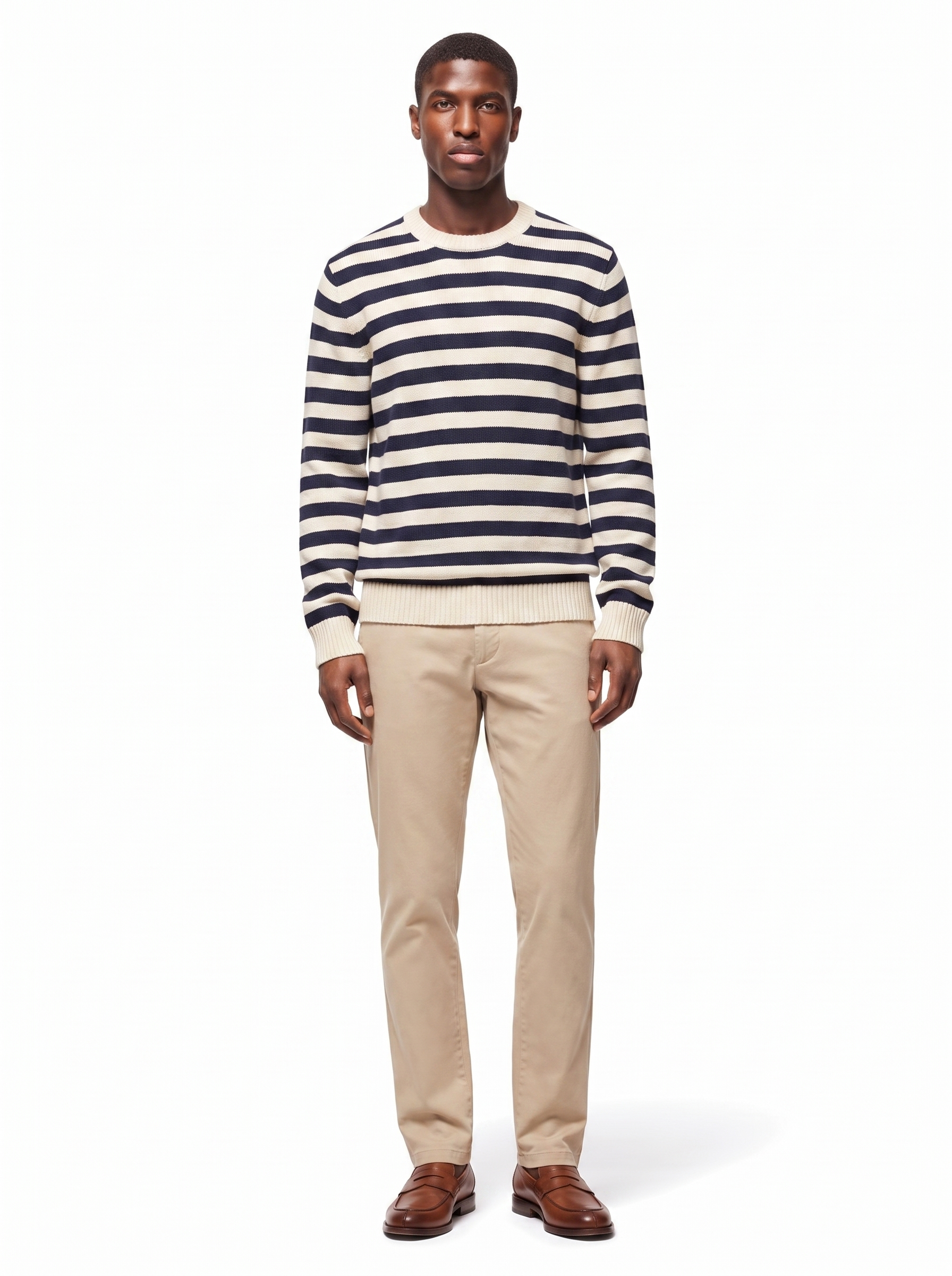 Navy and cream striped crew neck sweater, full-length view on model