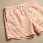 Men's striped swim trunks drawstring waist detail