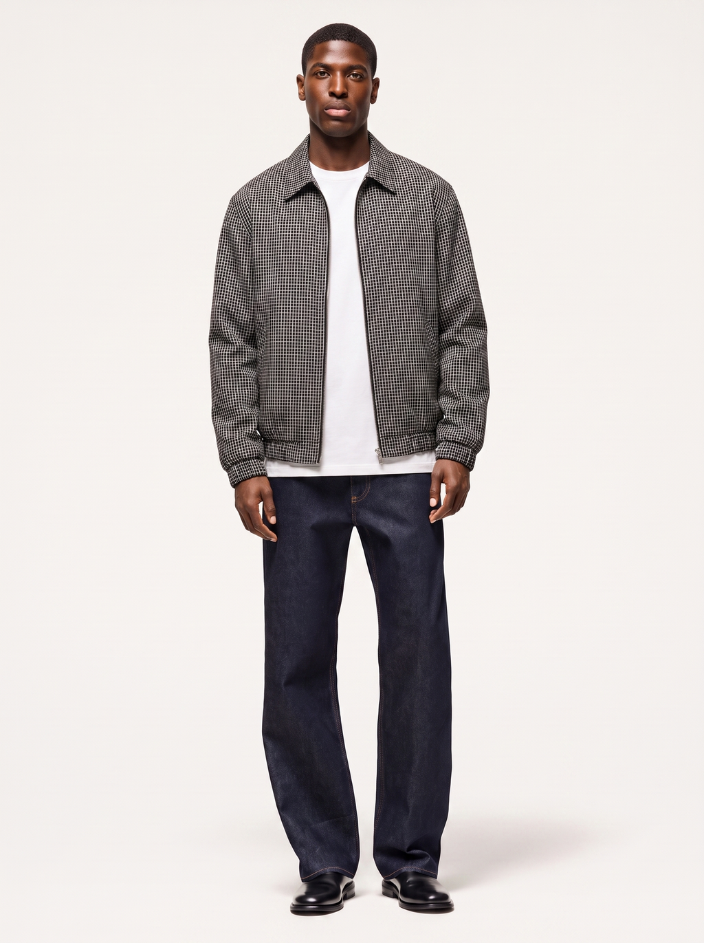 Black and white micro plaid harrington jacket, front view on model