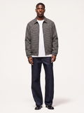 Black and white micro plaid harrington jacket, front view on model