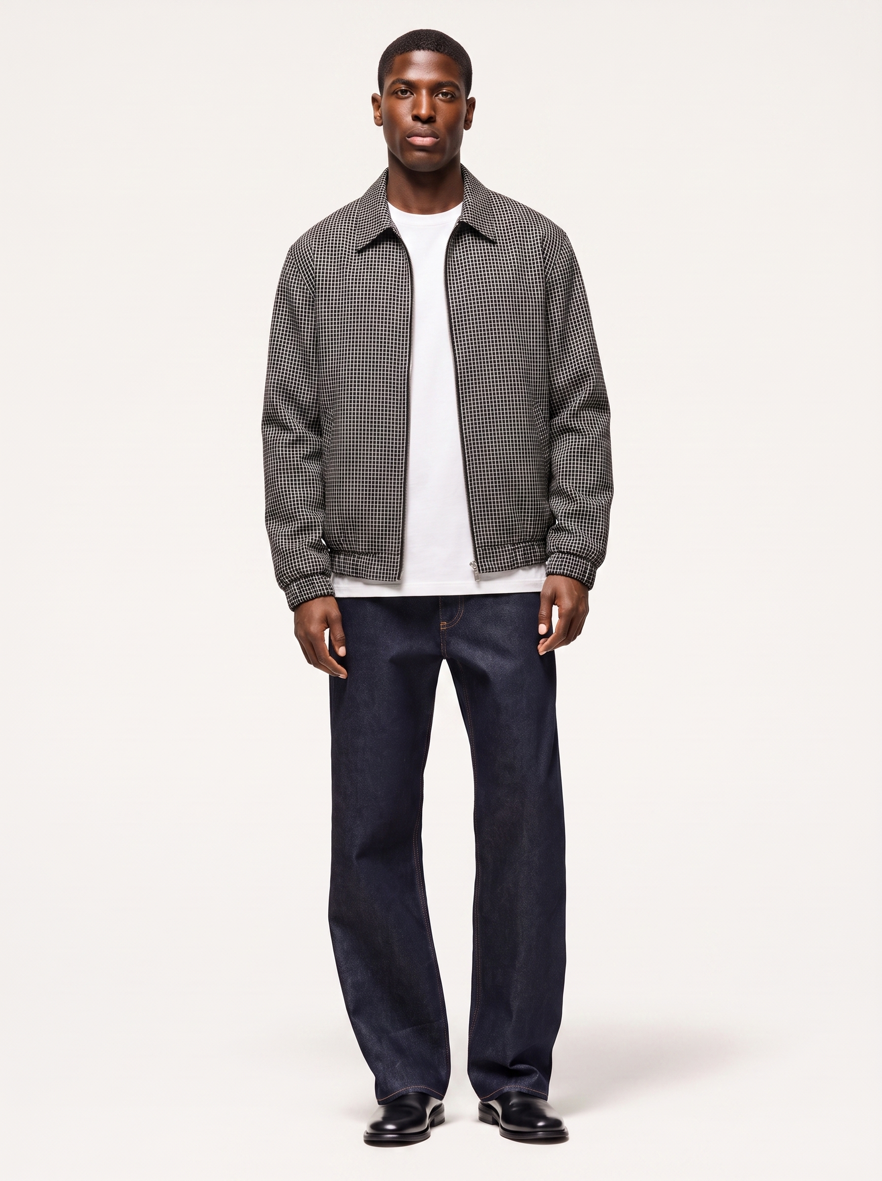Black and white micro plaid harrington jacket, front view on model