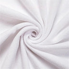 Microfiber beach towel spread out on the sand