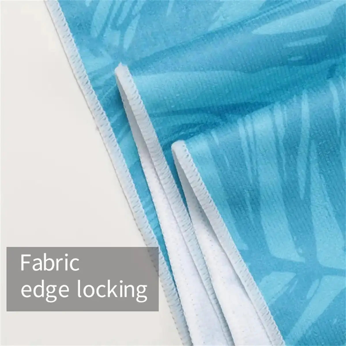 Microfiber beach towel folded to show its compact size