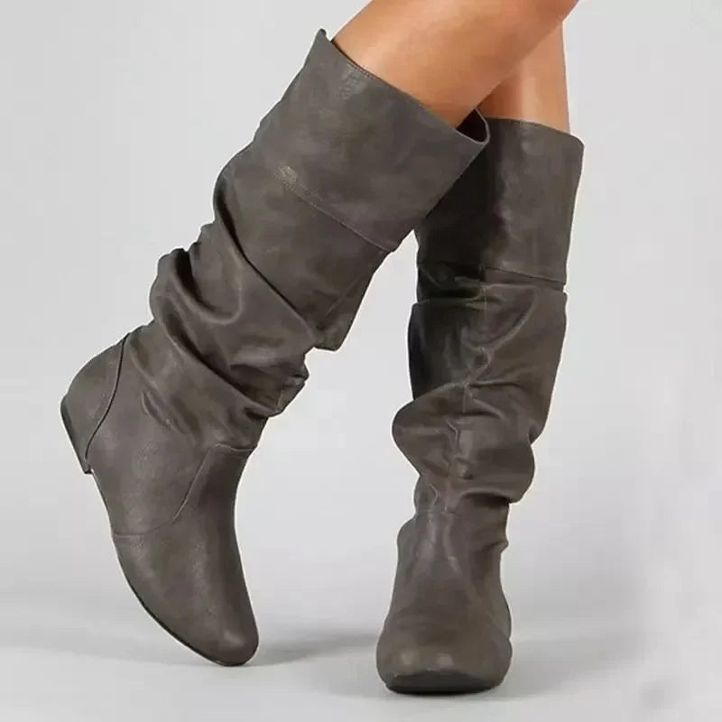 Mid-calf cowgirl boot, side view