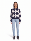 Navy argyle sweater on model, full body front view
