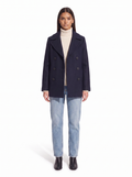 Navy pea coat on model, full body front view