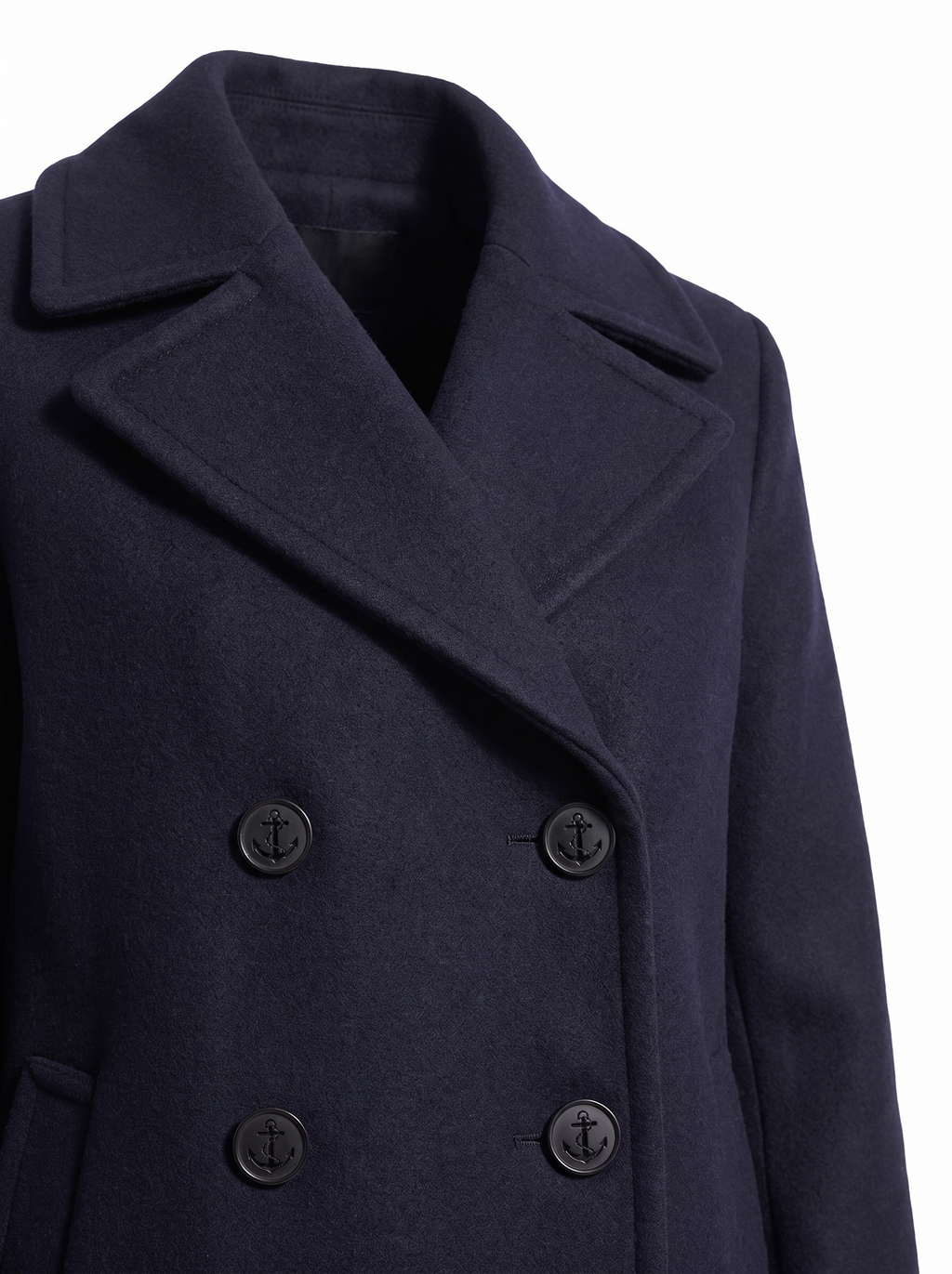 Wide lapel and anchor-style button detail, close up