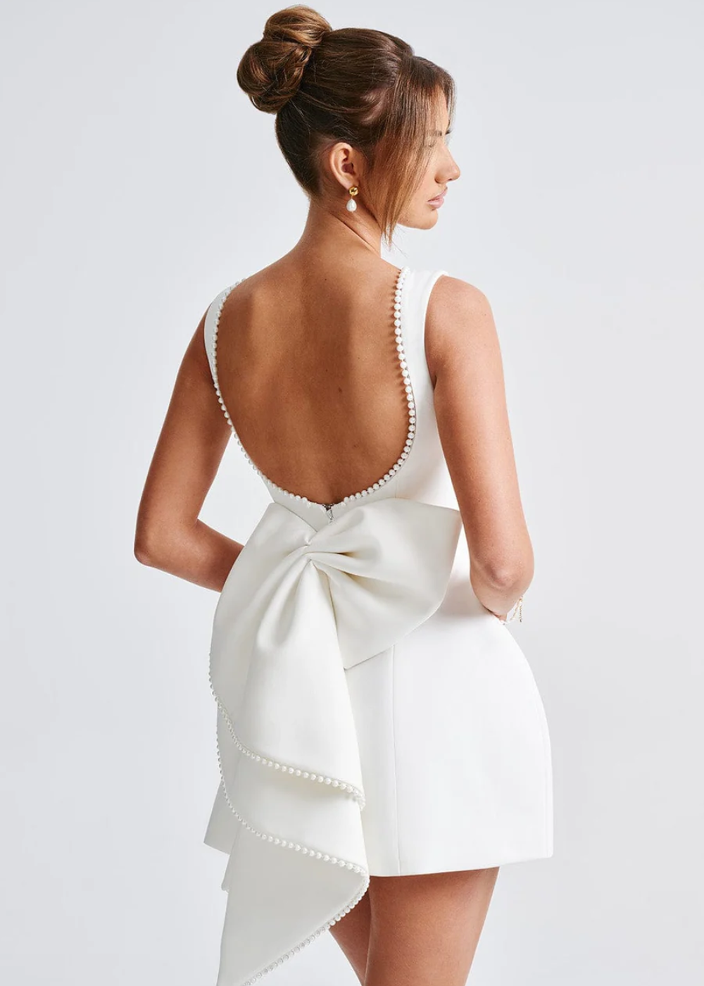 White pearl-beaded mini dress, front view