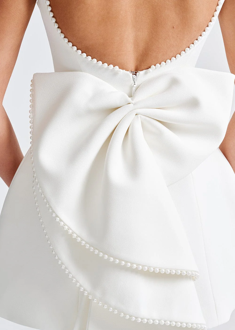 Close-up of pearl-style beading detail