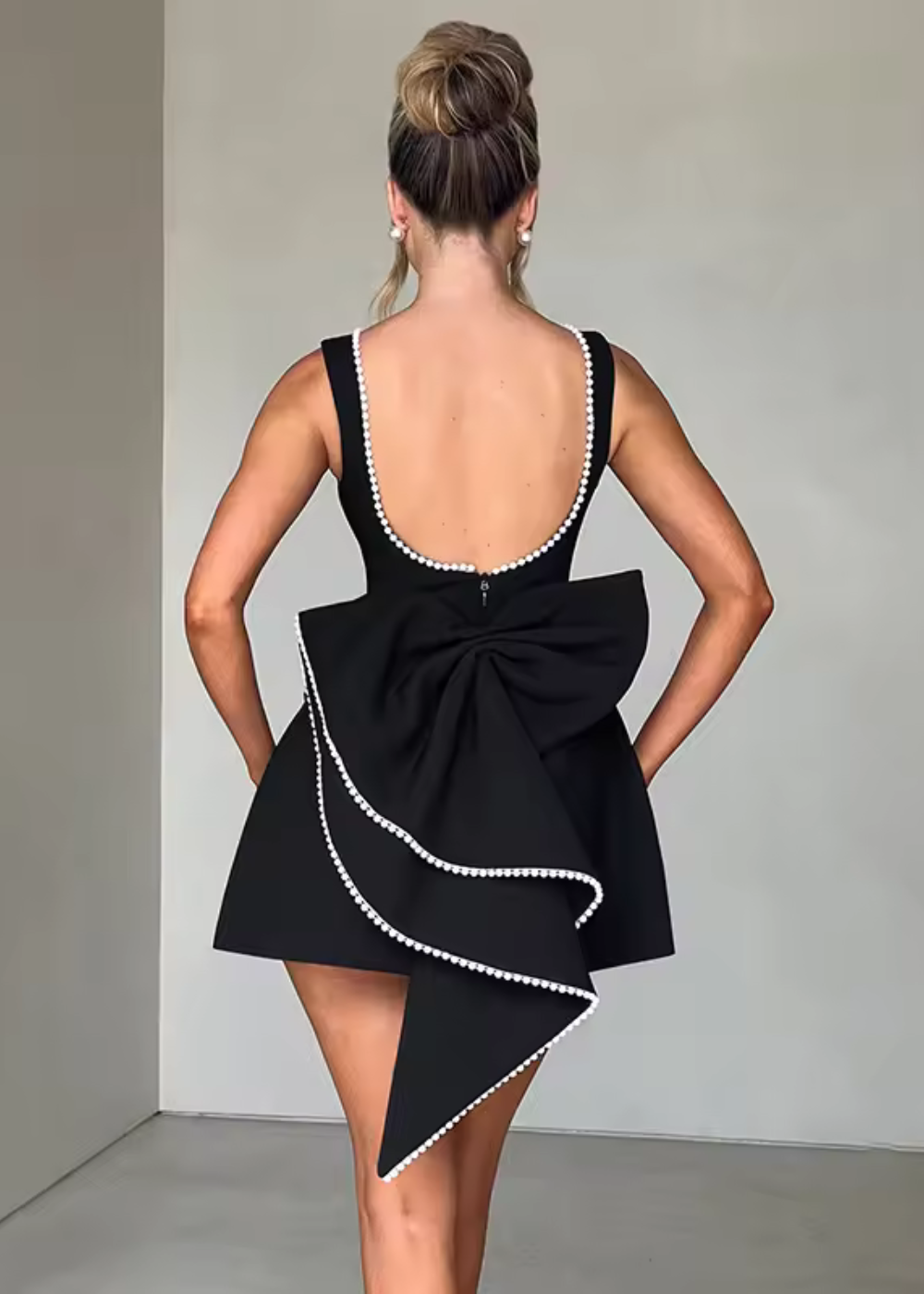Black pearl-beaded mini dress, full styling view