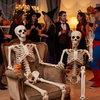 Posable skeletons displayed at an indoor Halloween party