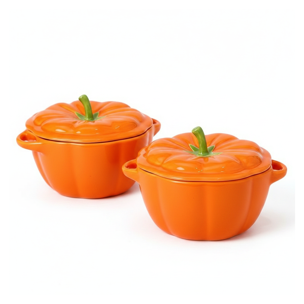 Pumpkin ceramic bowls with lids on a white background