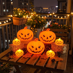 Ghost-face pumpkin lamp glowing on a decorated balcony at night
