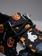 Close up of the pumpkin print detail on the loafers