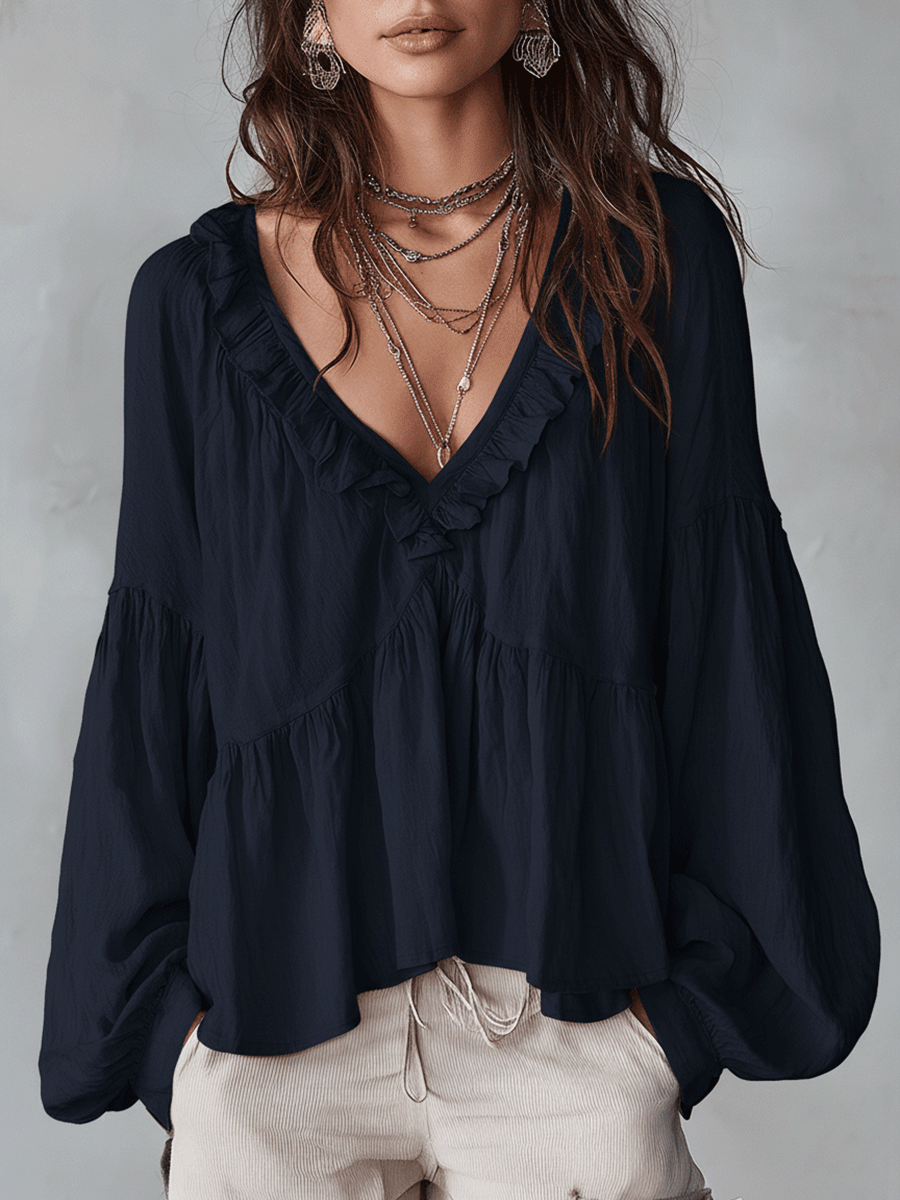 Ruffle blouse in navy blue