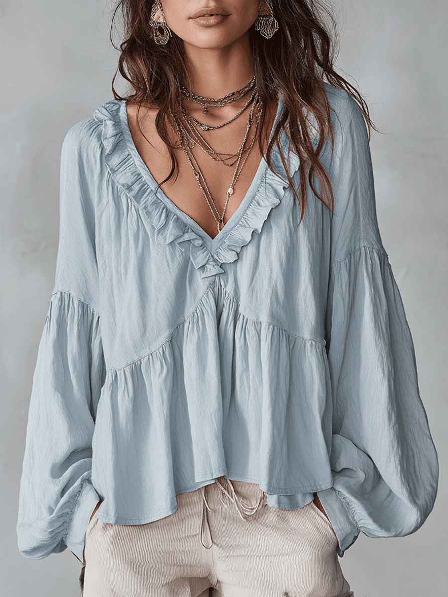 Ruffle blouse in blue