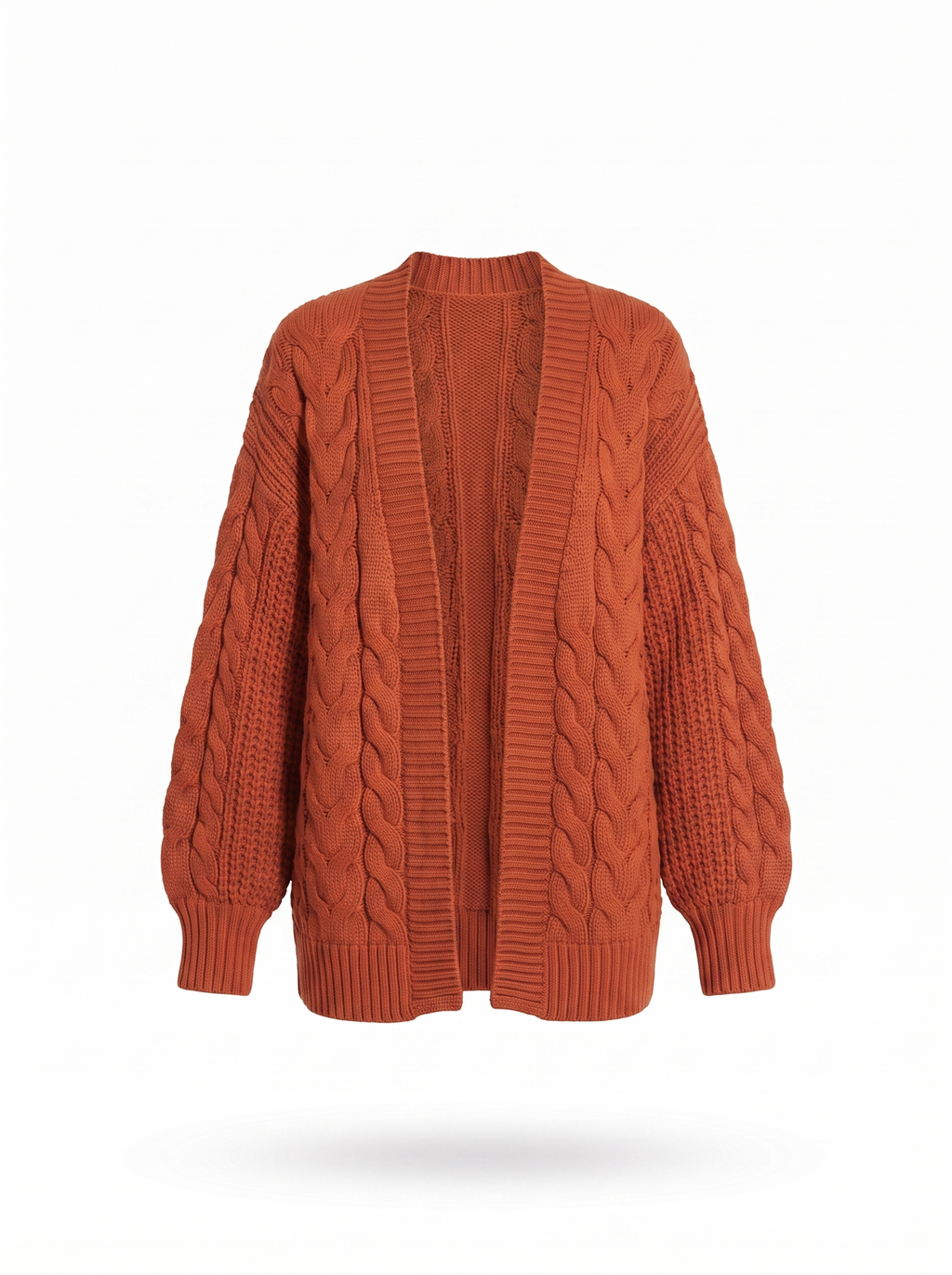Chunky cable knit cardigan on a white background